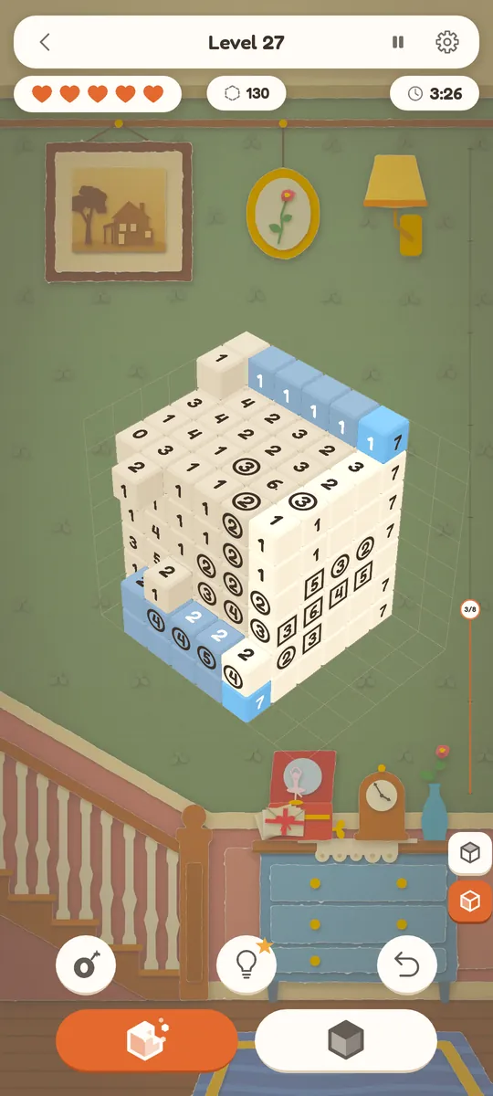 A block with its outer layers peeled away by the slice strip on the right edge of the screen, exposing numbers on the inner cubes.
